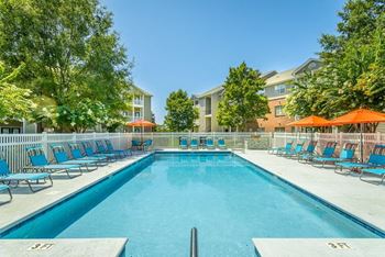 Two swimming pools with expansive sundeck